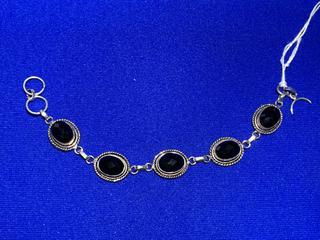 9" Black Onyx And Silver Bracelet.