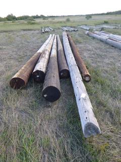 (6) 30 Ft. to 35 Ft. Wood Posts *Located Off Site Near Dunstable, AB, For More Information Contact Connor At 780-218-4493*