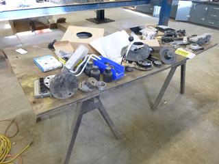 Contents Of Table Includes: Assorted Truck Parts, Bearings And Bearing Pullers