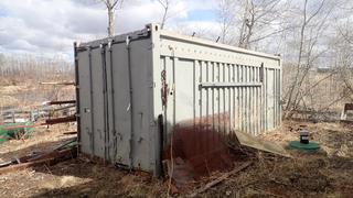 20ft Storage Container C/w Metal Rack, Wood Shelving, Valve Stems, Fittings And Misc Supplies *Note: Buyer Responsible For Load Out*