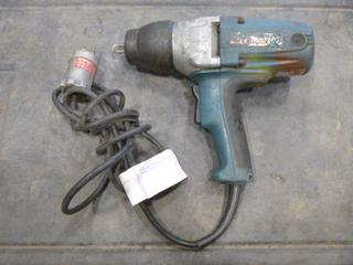 Makita 1/2 In. Electric Impact Wrench, Model TW0350 *Note: Working Condition Unknown* (E-1) 