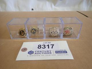 (1) 2010 Team Canada Sidney Crosby Olympic Gold Metal Champion Replica Ring w/ Case, (1) 1991 Canada Cup Championship Replica Ring w/ Case, (1) 1985 Team Canada Prague Championship Ring w/ Case, (1) 2004 Team Canada Simon Gagne World Cup of Hockey Championship Replica Ring w/ Case (Upstairs)