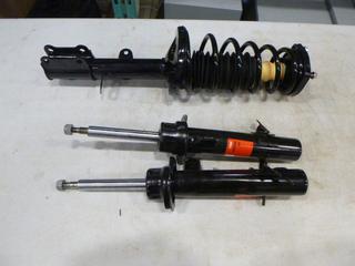 (2) TRW Gas Shocks Part JGM43795L, and (1) Strut Assembly (O-4-2)