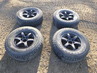 (4) Yokohama Geolander A/T GO15 LT265/70R17 Tires and Rims