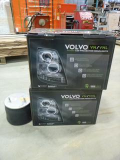 (2) Volvo Headlights, C/w (1) Air Bag * Note: Headlights Do Not Match The Description on Box Shown* (X3-1)