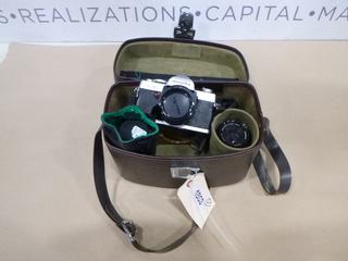 Minolta Camera w/ Case and Accessories (E-1)