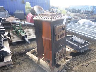 Antique 4 Leg Wood Stove w/ Custom Built 90 Degree Elbow into 6 In. Stove Pipe (NORTH FENCE)