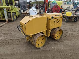 Wacker Neuson Vibratory Padfoot Double Drum Trench Compactor C/w Umbilical Remote Control, Lombardini 871cc Diesel Engine, 2960lbs. Showing 1340hrs. *Note: Runs S/N OBL*