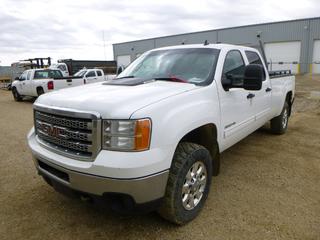 2012 GMC Sierra 3500 HD 4X4 Crew Cab Pick Up C/w 6.0L, A/T, Headache Rack And 8ft Box. Showing 254,285kms. VIN 1GT423CG8CF200227. UNIT 11 *Note: Check Engine Light, Minor Body Damage, Tailgate Damage And Hood Has Chips*