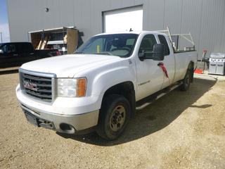 2008 GMC Sierra 2500HD Extended Cab Pick Up C/w 6.0L, A/T And Headache Rack. Showing 348,125kms. VIN 1GTHC29K98E163156. Unit 26. *Note: Check Engine Light On, Rust, Body Damage, Crack In Passenger Mirror, Drivers Side Seat Torn*