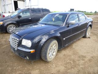 2005 Chrysler 300 c/w Hemi 5.7L V8, A/T, Showing 223,729 Miles, 235/55R18 Tires at 20%, VIN 2C3AA63H05H558069 *Note: Starts With Boost, Does Not Shift Into Gear, ABS Light On, Driver Front and Back Door Handles Broken, Interior and Exterior Damage, Rust*
