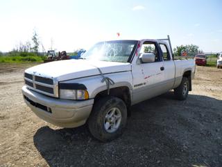 1997 Dodge Ram 1500 Laramie SLT 4X4 Extended Cab Pick Up c/w V8 Magnum Diesel, A/T, A/C, Showing 384,561 Kms, Headache Rack, LT265/75R16 Tires at 0%, 6 Ft. 5 In. Box, VIN 1B7HF1328VJ597434 *Note: Runs Rough, Check Engine Light On, Broken Windows, Windshield Requires Repair, Hood Hinge Broken, Damage To Exterior and Interior, Rust*