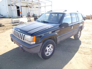 1994 Jeep Grand Cherokee 4X4 c/w 4.0L Inline 6, A/T, A/C, Showing 268,960 Kms, LT235/75R13 Tires at 40%, VIN 1J4GZ58S9RC240760 *Note: Brake Issue, Rust and Damage*