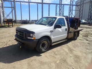 2004 Ford F-350 Flat Deck Welding Truck C/w 5.4L Triton, A/T, Side Storage And Miller Pro 300 CC/CV Single Phase DC Welding Generator w/ CAT 3013C Diesel Engine, Welder Showing 5137hrs. Showing 103,153Kms. VIN 1FTSF30LX4ED35407 *Note: Welder: Runs, Vehicle Requires New Battery*