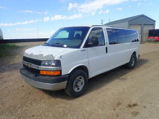 2009 Chevrolet Express 8-Passenger Van C/w 6.0L Vortec, V8, A/T. CVIP- 08/2021. Showing 156,545Kms. VIN 1GAHG39K791169131 *Note: Paint Peeling From Hood, Rust, Chips And Damage On Side*