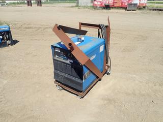 Miller Deltaweld 302 230/460/575V 3-Phase CV.DC Welding Power Source C/w 42in X 24in Steel Cart. SN LG440062C *Note: Running Condition Unknown, Has Out Of Service Tag On*