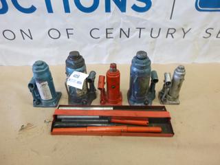 (2) 12 Ton Hydraulic Bottle Jacks, (1) 6 Ton Hydraulic Bottle Jack, (1) 4 Ton Hydraulic Bottle Jack, (1) 2 Ton Hydraulic Bottle Jack and Tray w/ Handle (X2)