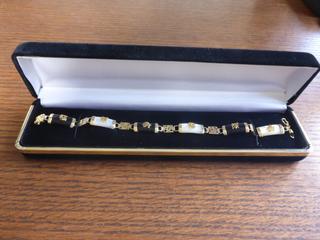 Unused Black/White Bracket w/ Gold Toned Accents 