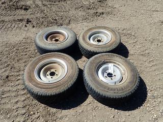 (4) 15 In. 5 Stud Rims To Fit GMC or Chevrolet 1500, (2) Dunlop Radial Rover 235/75R15 Tires, (1) Goodyear Invicta 235/75R15 Tire, (1) Westlake SL369 235/75R15 Tires