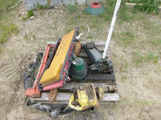 Floor Jack, Hydromatic Submersible Sump Pump, CMC Gas Power Drill (Working Condition Unknown), (2) Floor Creepers, (3) Grease Pumps, (3) Pipe Wrench Handles (Row 3)