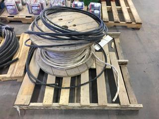 *SELLING OFF-SITE* (2) Rolls of Insulated Wire. *Length Unknown*  Location:  504 - 8 Ave East Bow Island, AB