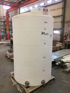*SELLING OFF-SITE* Plastic Water Tank 2500L.  Location:  504 - 8 Ave East Bow Island, AB