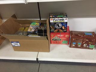 (2) 70 Light LED Christmas Outdoor Lights, Quantity of VHS Rodeo Bloopers , Box of Assorted  New DVD's, CD's & Label Maker w/Hardware, R/C Flight Simulator & Fushigi Magic Gravity Ball.