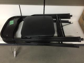 (3) Black folding Chairs.