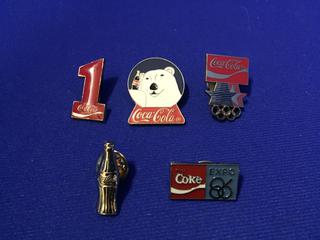 (1) Coca-Cola Expo '86, (1) Olympic & (3) Assorted Lapel Pins.
