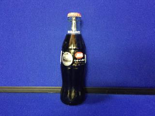 Coca-Cola 6-1/2oz Lois & Clark Commemorative Bottle.