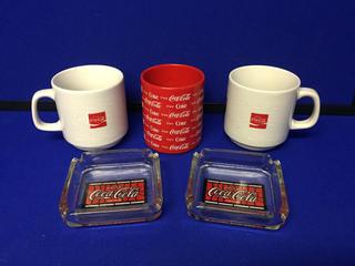 (3) Coca-Cola Mugs & (2) Coca-Cola Ashtrays.