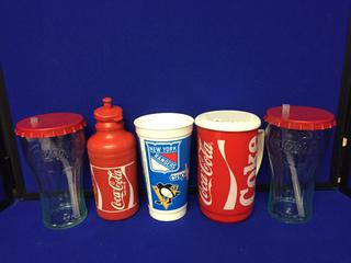 (5) Coca-Cola Plastic Bottles & Glasses.