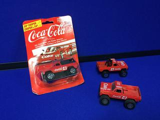 (3) Coca-Cola Truck Toys.