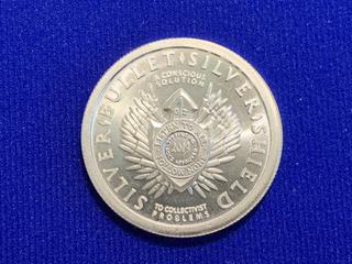 2013 Silver Shield One Ounce .999 Fine Silver Token.