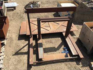 (1) 63"x53"x90" Saw Horse, (1) 46"x41"x70" Saw Horse & (2) Misc. Sheets of 3/8" Steel.