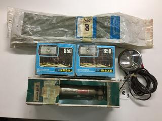 (2) S.E.V. Marchal Halogen Lights, (1) Handheld Chrome Spotlight, Quantity of Rocker Cover Gaskets & Delco Pleasurizer Front Shock.