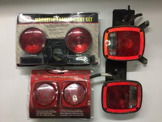 (2) 2 Piece Trailer Light Kits & (1) Set of Tail Lights. 