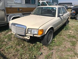 Selling Off- Site -  1986 Mercedes Benz 420 SEL c/w V8, Auto, Showing 318,222 Kms. For Parts, No Key, Running Condition Unknown,  VIN WDBCA35016A242385.  Location - 527 North 200 East, Raymond, AB -  For Further Information Please Call Chris 403-308-1161.