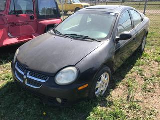 Selling Off- Site -  2003 Dodge Neon c/w 4 Cyl, Auto, Showing 154478 Kms, VIN 1B3ES56C63D18531.  Location - 527 North 200 East, Raymond, AB -  For Further Information Please Call Chris 403-308-1161.