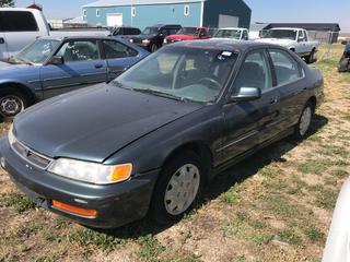 Selling Off- Site -  1996 Honda Accord c/w 4 Cyl, Auto, Showing 278,055 Kms, Body Damage Right Side, VIN 1HGCD5639TA801994.  Location - 527 North 200 East, Raymond, AB -  For Further Information Please Call Chris 403-308-1161.