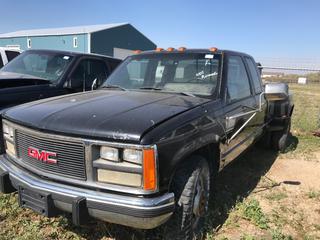 Selling Off- Site -  1988 GMC 3500 Extended Cab Dually c/w V8, Auto, Engine Not Running, Showing 180,298 Kms, VIN 2GTHC39N3J1561793.  Location - 527 North 200 East, Raymond, AB -  For Further Information Please Call Chris 403-308-1161.