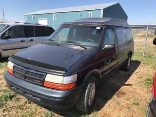 Selling Off- Site -  1995 Dodge Caravan c-w V6, Auto, Wheel Chair Ramp, Showing 189,850 Kms, VIN 1B4GH44R8SX603034.  Location - 527 North 200 East, Raymond, AB -  For Further Information Please Call Chris 403-308-1161.