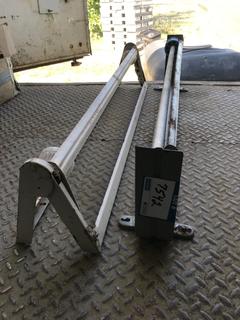 Selling Off- Site -  (2) 36" Wrapping Paper Holders.  Location - 527 North 200 East, Raymond, AB -  For Further Information Please Call Chris 403-308-1161.