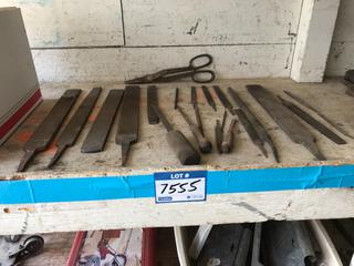 Selling Off- Site -  Approximately (2) Files & Tin Snips.  Location - 527 North 200 East, Raymond, AB -  For Further Information Please Call Chris 403-308-1161.