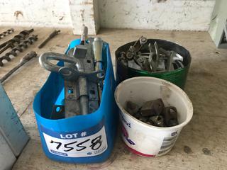 Selling Off- Site -  Container of Misc. Cable Clamps, Muffler Clamps & Gate Latches.  Location - 527 North 200 East, Raymond, AB -  For Further Information Please Call Chris 403-308-1161.