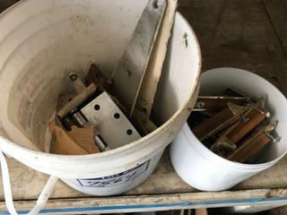 Selling Off- Site -  (2) Containers of Door Hinges, Gate Hinges & Hardware.  Location - 527 North 200 East, Raymond, AB -  For Further Information Please Call Chris 403-308-1161.