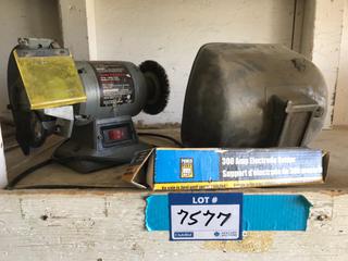 Selling Off- Site -  300 Amp Electrode Holder w/Antique Welding Helmet and Bench Grinder..  Location - 527 North 200 East, Raymond, AB -  For Further Information Please Call Chris 403-308-1161.
