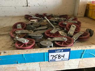 Selling Off- Site -  Approximately (32) Misc. Pulleys.  Location - 527 North 200 East, Raymond, AB -  For Further Information Please Call Chris 403-308-1161.