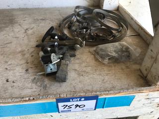 Selling Off- Site -  Approximately (30) Misc. Size Hose Clamps, (5) Rubber Latches w/Hardware.  Location - 527 North 200 East, Raymond, AB -  For Further Information Please Call Chris 403-308-1161.