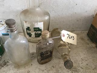Selling Off- Site -  (3) Antique Bottles.  Location - 527 North 200 East, Raymond, AB -  For Further Information Please Call Chris 403-308-1161.